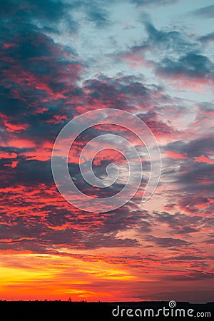 Beautiful fiery orange sunset sky with horizon Stock Photo