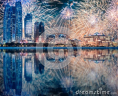 Beautiful fireworks above Abu Dhabi Skyline at night, UAE Stock Photo