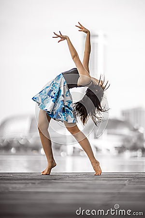 Beautiful Flexible Young Woman Dancing Stock Photo