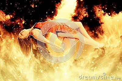 Beautiful Floating woman on fire Stock Photo