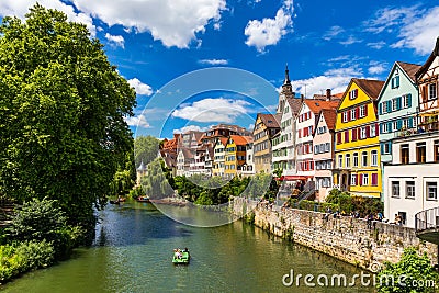 Beautiful floral colorful town Tubingen in Germany Baden-Wurttemberg. Houses at river Neckar and Hoelderlin tower, Tuebingen, Stock Photo