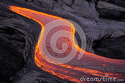 Flowing lava in Hawaii Stock Photo