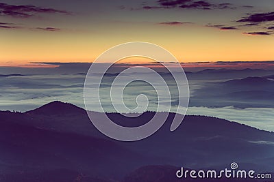 Beautiful foggy morning in the mountains. Stock Photo