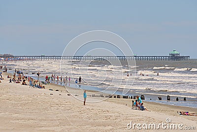 Beautiful Folly Beach, SC with pier in backgroun Editorial Stock Photo