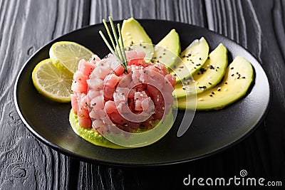 Beautiful food: fresh tuna tartar with lime, avocado and sesame Stock Photo