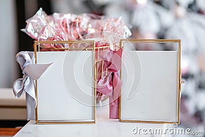 Beautiful frames and other Christmas details in decorated room Stock Photo