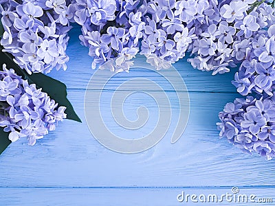 Beautiful fresh lilac decoration greeting anniversary mothers day gift holiday on a wooden background border Stock Photo