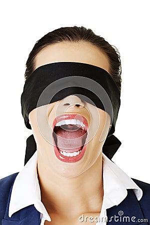 Beautiful frighten young blindfold woman Stock Photo