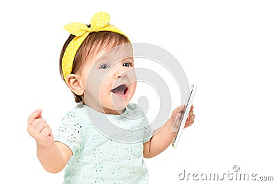 Beautiful funny baby girl with a mobile phone Stock Photo