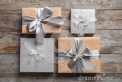 Beautiful gift boxes on wooden background, Stock Photo