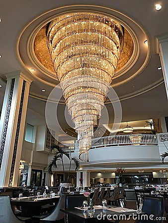 A beautiful gigantic chandelier inside The Restaurant of Dusit Thani Hua Hin Hotel in Thailand. Editorial Stock Photo
