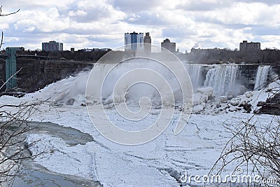 Beautiful gigantic frozen Niagara Waterfalls on a frozen spring day in Niagara Falls in Ontario, Canada Stock Photo