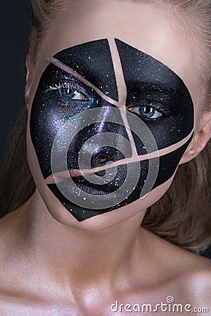 Beautiful girl with art creative make-up. Beauty is an art face. Stock Photo