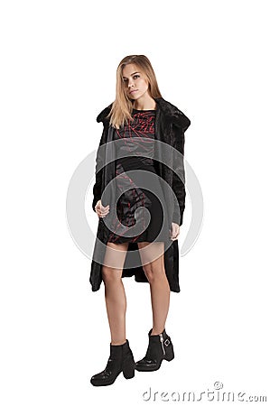 Beautiful girl in black fur coat isolated elegance glamour Stock Photo