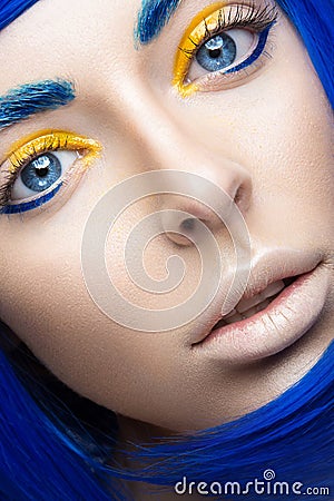 Beautiful girl in a bright blue wig in the style of cosplay and creative makeup. Beauty face. Art image. Stock Photo