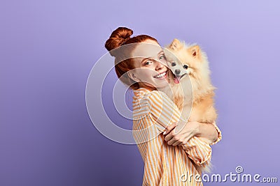 Beautiful girl cannot imagine her life without her pet Stock Photo