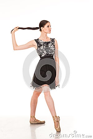 Beautiful girl dancing fun in the camera, posing against white background Stock Photo