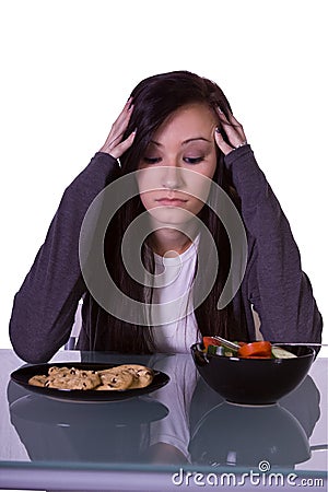 Beautiful Girl Deciding What to Eat Stock Photo