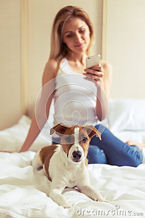 Beautiful girl with dog Stock Photo