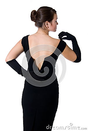 Beautiful girl in a dress with an open back Stock Photo