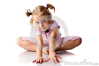 Beautiful girl exercising, butterfly pose Stock Photo