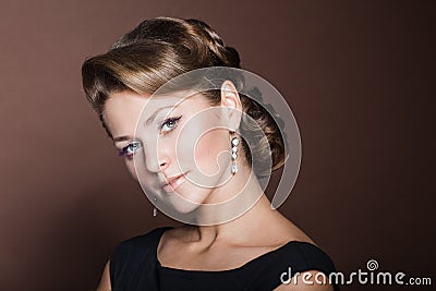 Beautiful girl with an exquisite hairdo Stock Photo