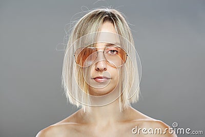 Beautiful girl fashion portrait. Short hair and glasses Stock Photo