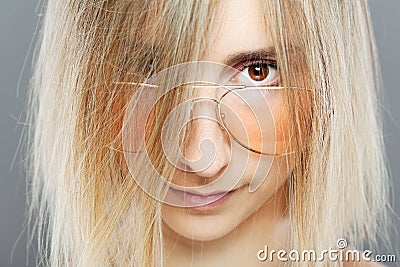 Beautiful girl fashion portrait. Short hair and glasses Stock Photo