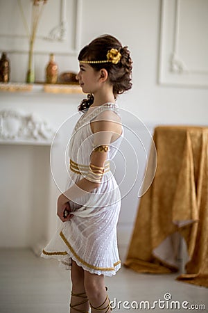 Beautiful girl in Greek dress Stock Photo