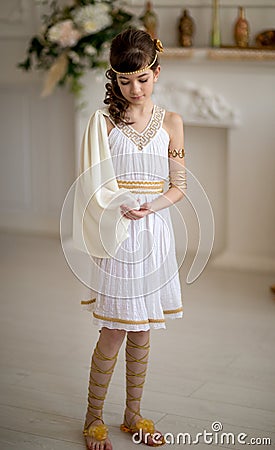 Beautiful girl in Greek dress Stock Photo