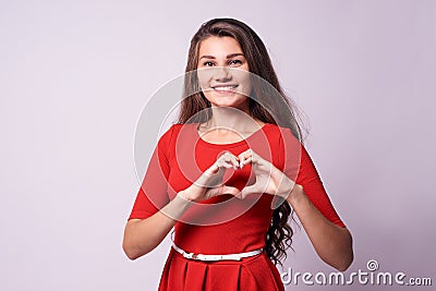 Beautiful girl. Heart. Love. Portrait brunette Stock Photo