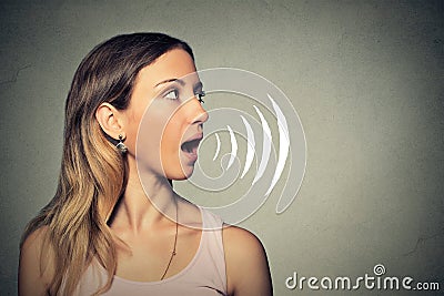 Beautiful girl with her mouth open speaking Stock Photo