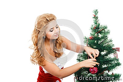 Beautiful girl holding christmas toy isolated white background. Stock Photo