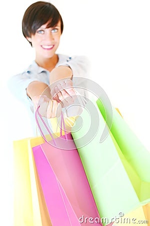 Beautiful girl holding colorful shopping bags Stock Photo