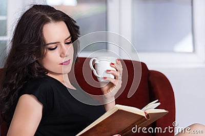 Cozy Moments: Coffee, Books, and Comfort Stock Photo
