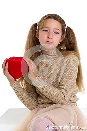 Beautiful girl holding red heart Stock Photo