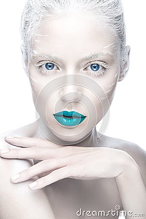 Beautiful girl in the image of albino with blue lips and white eyes. Art beauty face. Stock Photo