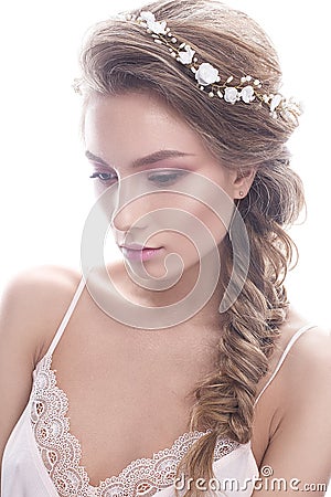 Beautiful girl in image of bride with Ð° wreath of flowers on her hair. Beauty face. Stock Photo