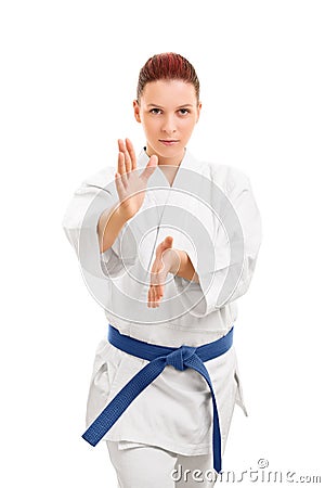Beautiful girl in a kimono making a combat stance Stock Photo