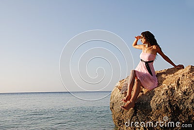 Beautiful girl looking far away Stock Photo