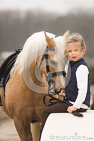 Beautiful Girl love horse in farm. park on background Stock Photo