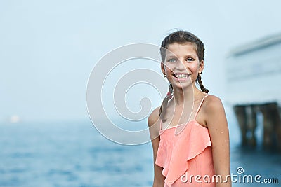 Beautiful Girl on The Pier. Sea Stock Photo