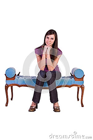 Beautiful Girl Posing on the Antique Couch Stock Photo