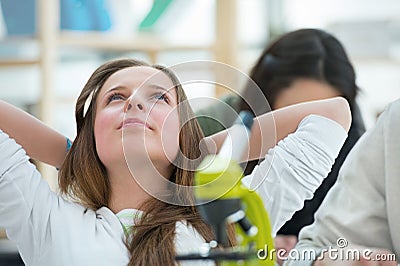 Beautiful girl relaxing at biology classroom Stock Photo