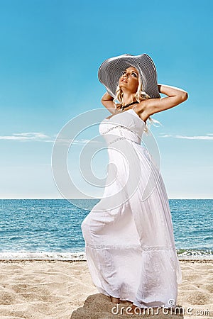Beautiful girl on the seashore Stock Photo