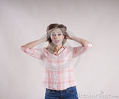 Beautiful girl shirt jeans studio emotions Stock Photo