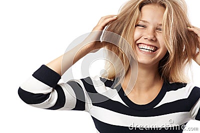 Beautiful girl in a striped sweater laughing Stock Photo