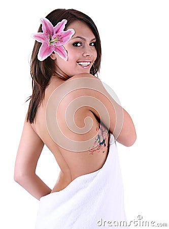 Beautiful girl with tattoo and flower. Stock Photo