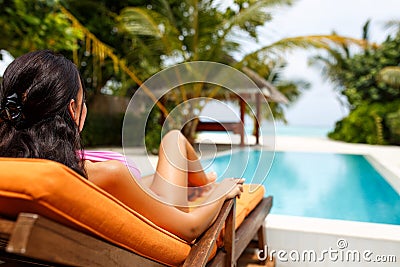 Beautiful girl wearing bikini in paradise island Stock Photo