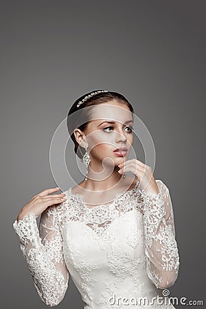 Beautiful girl in wedding decoration. Studio Stock Photo